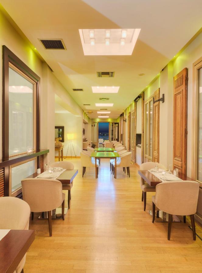 Gdm梅格荣历史纪念碑酒店 伊拉克利翁 外观 照片 Restaurant